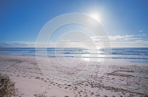 Conceptual background for travel holiday vacation bright sun rising over ocean