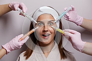 Conceptual beauty and cosmetology image of the hands of several beauticians holding their respective equipment. Beauty