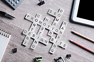 Conceptual business keywords on table with wooden elements