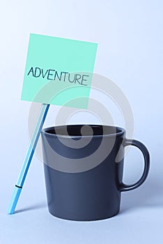 Conceptual caption Adventure. Word Written on enterprise involving financial risk, danger and unknown risks