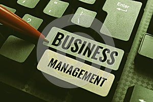 Conceptual caption Business Management. Business overview Rewriting Aiming Improving Start a Different Future Computer