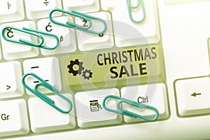 Conceptual caption Christmas Sale. Business concept period during which a retailer sells goods at reduced prices Typist