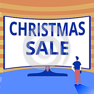 Conceptual caption Christmas Sale. Business idea period during which a retailer sells goods at reduced prices Man