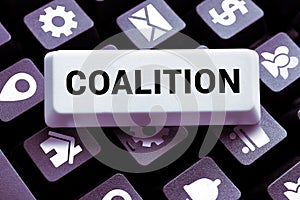 Conceptual caption Coalition. Word Written on a temporary alliance of distinct parties, persons, or states for joint