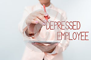 Conceptual caption Depressed Employee. Business concept worker in a state of general unhappiness or despondency