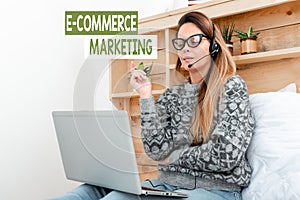 Conceptual caption E Commerce Marketing. Word for business that sells product or service electronically Student Learning