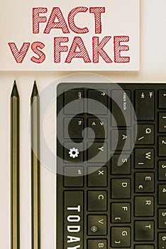 Conceptual caption Fact Vs Fake. Business concept Rivalry or products or information originaly made or imitation photo