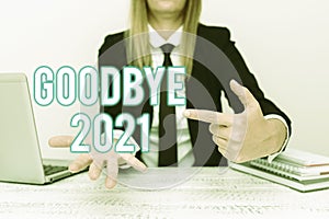 Conceptual caption Goodbye 2021. Word Written on New Year Eve Milestone Last Month Celebration Transition Explaining photo