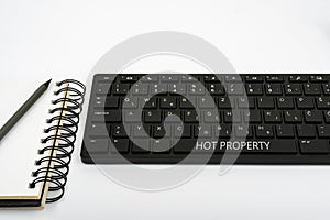 Conceptual caption Hot Property. Concept meaning Something which is sought after or is Heavily Demanded Computer