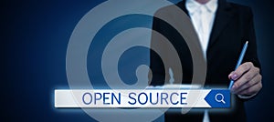 Conceptual caption Open Source. Business approach denoting software which original source code freely available