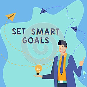 Conceptual caption Set Smart Goals. Internet Concept Establish achievable objectives Make good business plans