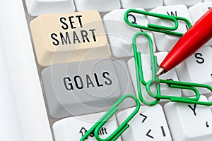 Conceptual caption Set Smart Goals. Word for Establish achievable objectives Make good business plans