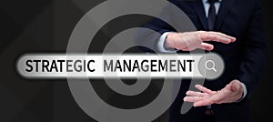 Conceptual caption Strategic Management. Business concept formulation and implementation of the major goals