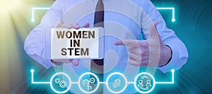 Conceptual caption Women In Stem. Business idea Science Technology Engineering Mathematics Scientist Research