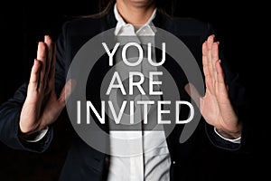 Conceptual caption You Are Invited. Business idea Receiving and invitation for an event Join us to celebrate Empty Paper