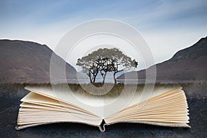 Conceptual composite open book image of Beautiful foggy misty Autumn sunrise over countryside surrounding Crummock Water in Lake