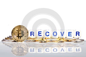 Conceptual cryptocurrency bitcoin with the word Recover