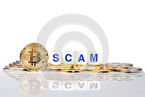 Conceptual cryptocurrency bitcoin with the word Scam photo