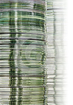 Conceptual data image with layered stacks of silver metallic DVD and CD disks