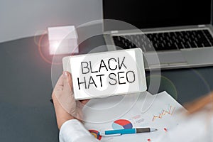 Conceptual display Black Hat Seo. Word for Search Engine Optimization using techniques to cheat browsers Three Business