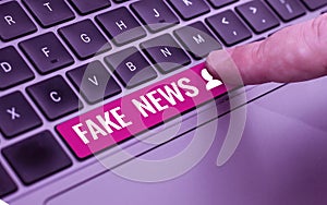 Text showing inspiration Fake News. Business idea Giving information to showing that is not true by the media photo