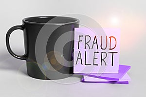 Conceptual display Fraud Alert. Business concept security alert placed on credit card account for stolen identity
