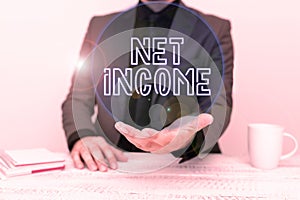 Conceptual display Net Income. Business concept the gross income remaining after all deductions and exemptions are taken