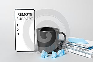 Handwriting text Remote Support. Business approach help end-users to solve computer problems and issues remotely