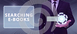 Conceptual display Searching E Books. Business idea process of making yourself a better or more knowledgable photo