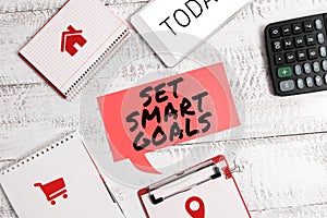 Conceptual display Set Smart Goals. Word for Establish achievable objectives Make good business plans