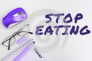 Conceptual display Stop Eating. Internet Concept cease the activity of putting or taking food into the mouth