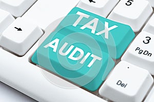 Conceptual display Tax Audit. Business concept examination or verification of a business or individual tax return