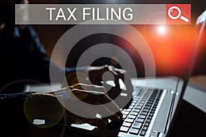 Conceptual display Tax Filing. Word for Submitting documens filed with tax payer financial information