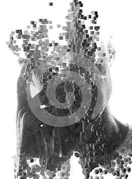 A conceptual double exposure portrait of a man with a 3D shape pattern