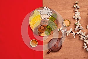 Conceptual flat lay Chinese New Year food and drink still life.