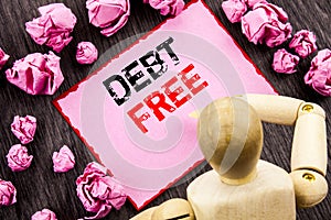 Conceptual hand text showing Debt Free. Concept meaning Credit Money Financial Sign Freedom From Loan Mortage written on Sticky No