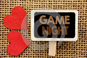 Conceptual hand text showing Game Night. Business photo showcasing Entertainment Fun Play Time Event For Gaming written on blackbo