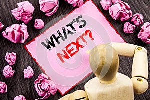 Conceptual hand text showing What is Next Question. Concept meaning Next Future Plan Vision Progress Goal Guidance written on Stic