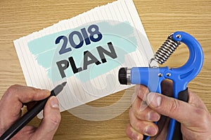 Conceptual hand writing showing 2018 Plan. Business photo showcasing Challenging Ideas Goals for New Year Motivation to Start Conc