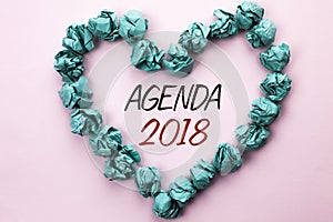 Conceptual hand writing showing Agenda 2018. Business photo text Strategy Planning Things Schedule Future Goals Organize written o