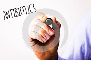 Conceptual hand writing showing Antibiotics. Business photos text Drug used in treatment and prevention of bacterial infectionsMan