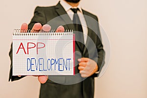 Conceptual hand writing showing App Development. Business photo text the act or process by which a mobile app is developed Male