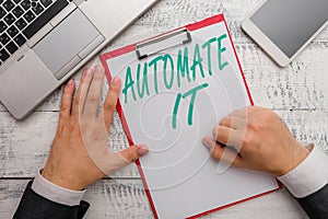 Conceptual hand writing showing Automate It. Business photo text convert process or facility to be operated automatic