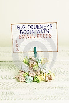 Conceptual hand writing showing Big Journeys Begin With Small Steps. Business photo text One step at a time to reach