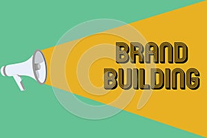 Conceptual hand writing showing Brand Building. Business photo showcasing Generating awareness Establishing and promoting company