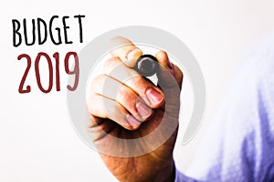 Conceptual hand writing showing Budget 2019. Business photos text New year estimate of incomes and expenses Financial PlanMan hold