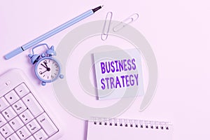 Conceptual hand writing showing Business Strategy. Business photo text Management game plan to achieve desired goal or objective