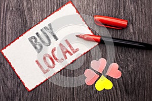 Conceptual hand writing showing Buy Local. Business photo text Buying Purchase Locally Shop Store Market Buylocal Retailers writte