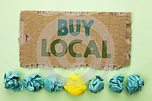 Conceptual hand writing showing Buy Local. Business photo text Buying Purchase Locally Shop Store Market Buylocal Retailers writte photo