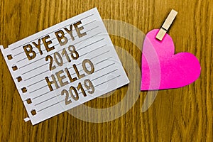 Conceptual hand writing showing Bye Bye 2018 Hello 2019. Business photo showcasing Starting new year Motivational message 2018 is